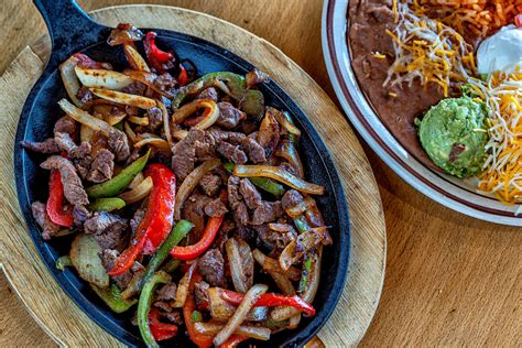 Fajitas mexican grill - At Fajitas we create traditional Mexican food with flavors that make us unique. Discover our fajitas, enchiladas, tacos, carnitas, choripollo, molcajete and more. Skip to content. 843.626.0749 1207 3rd Ave S, Myrtle Beach, SC 29577. ...